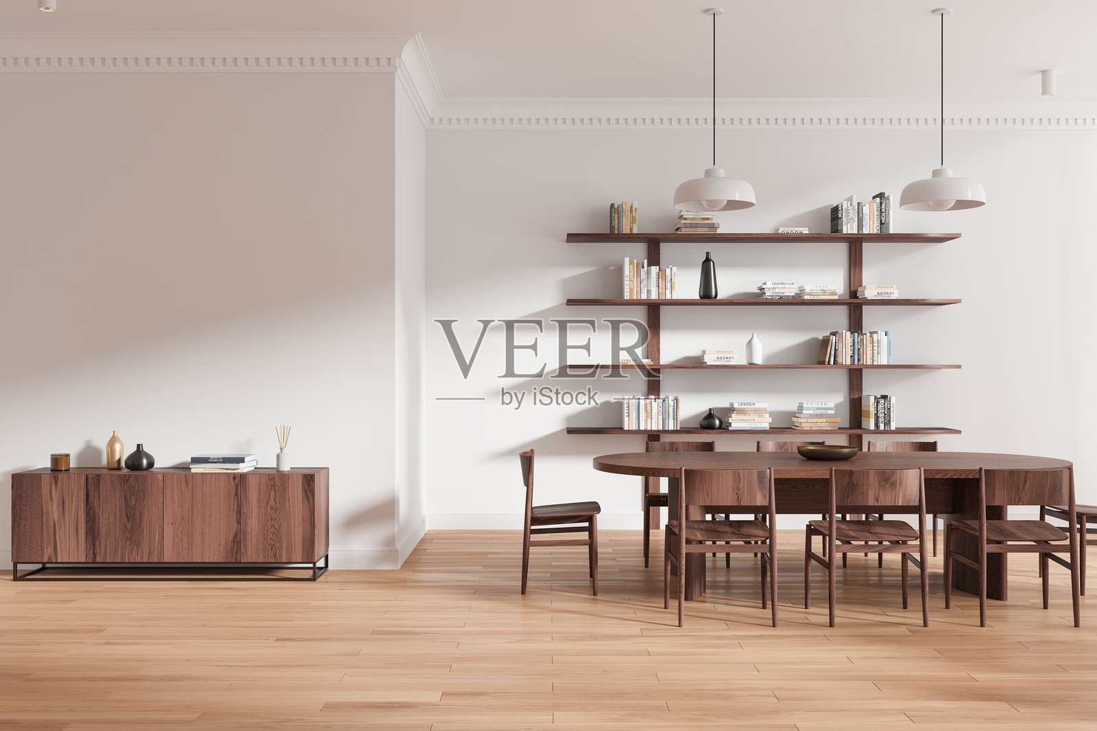 时尚的家居客厅室内,配有餐桌和椅子,装饰架上摆放着装饰品照片摄影图片