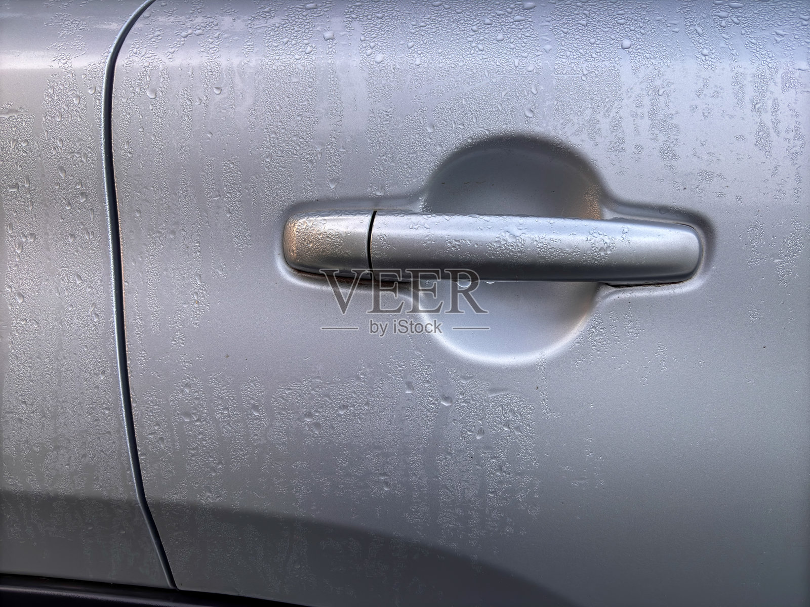 汽车门把手上布满了锈迹照片摄影图片