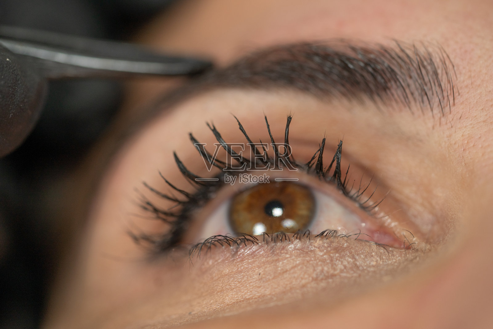 美容中心的拔毛服务照片摄影图片