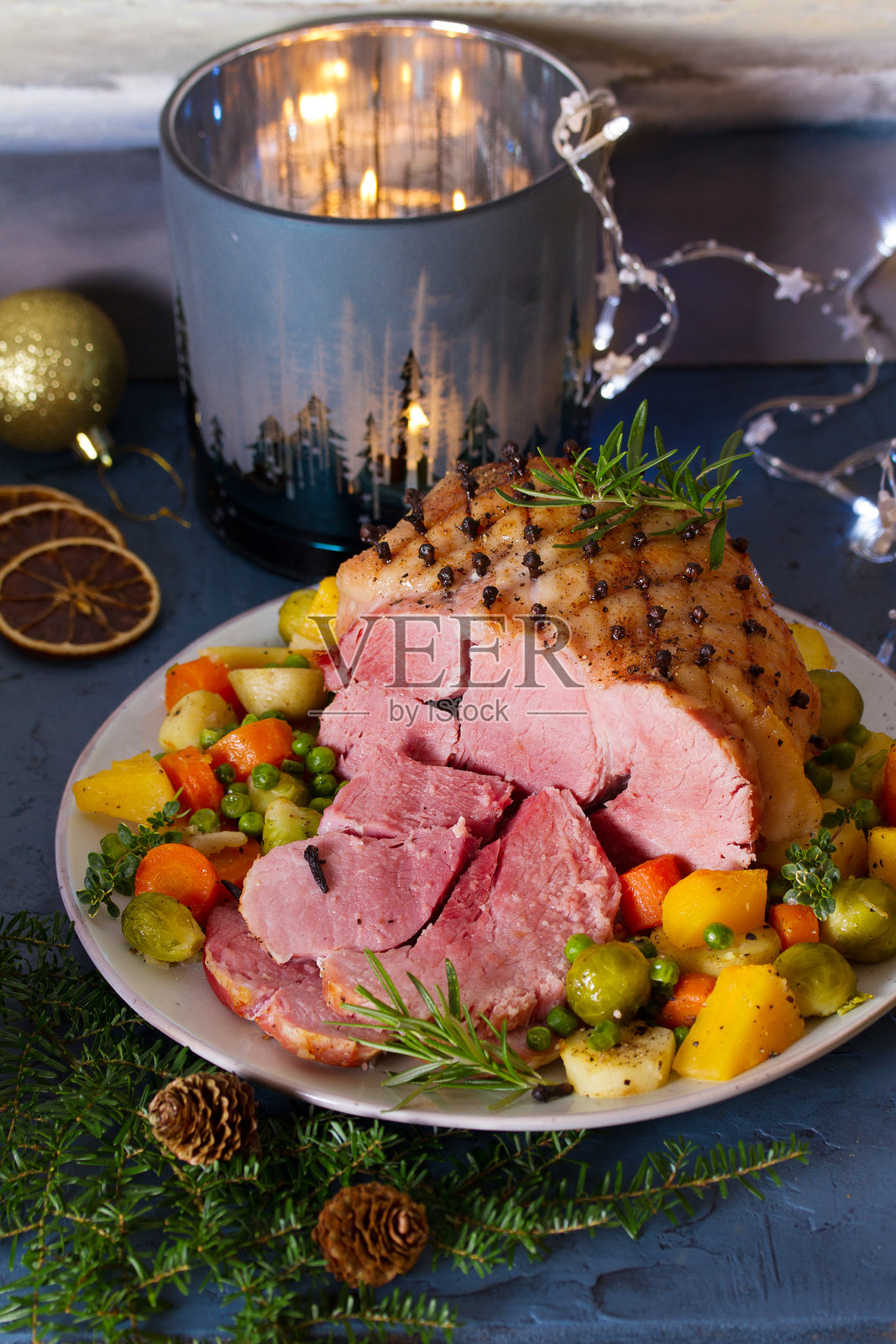 丁香烤火腿配蔬菜照片摄影图片