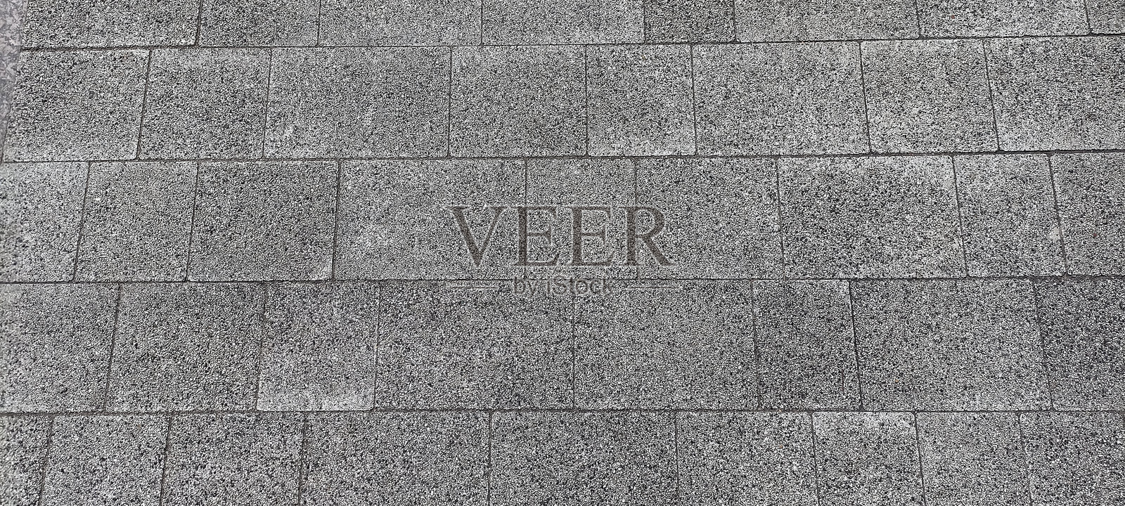 表面覆盖着灰色矩形瓷砖照片摄影图片