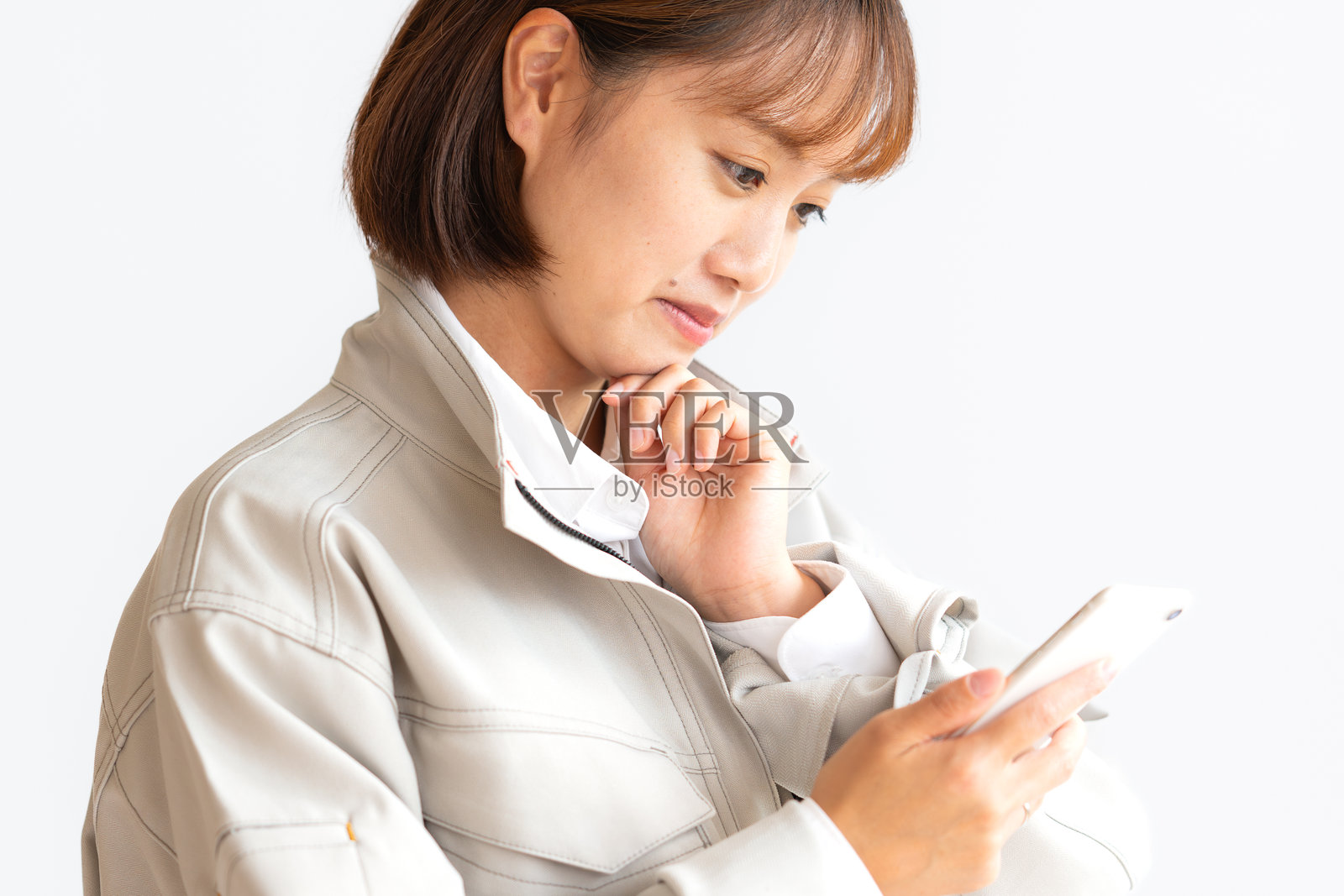 手机和女人照片摄影图片