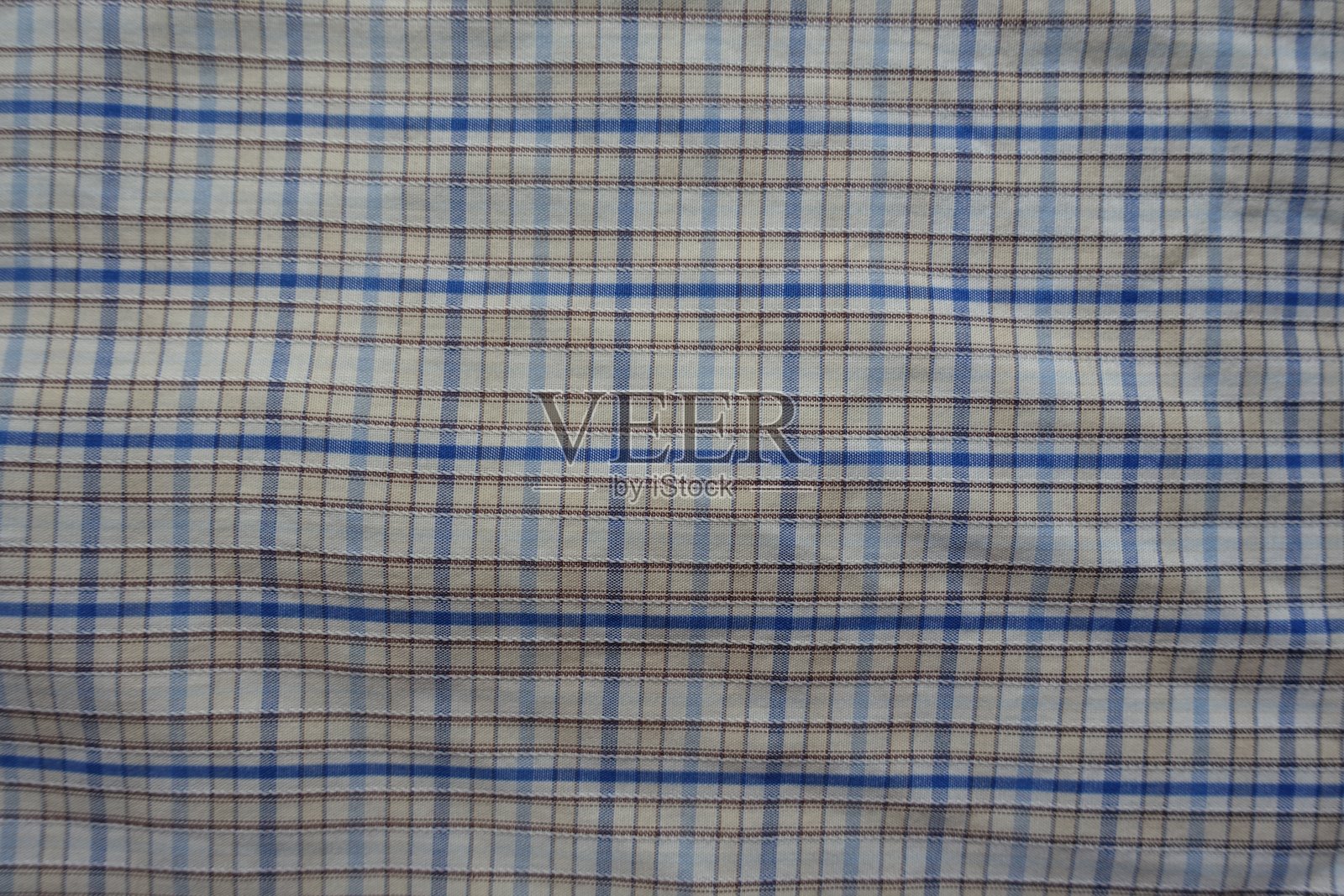 白色、蓝色和棕色格子棉布背景照片摄影图片