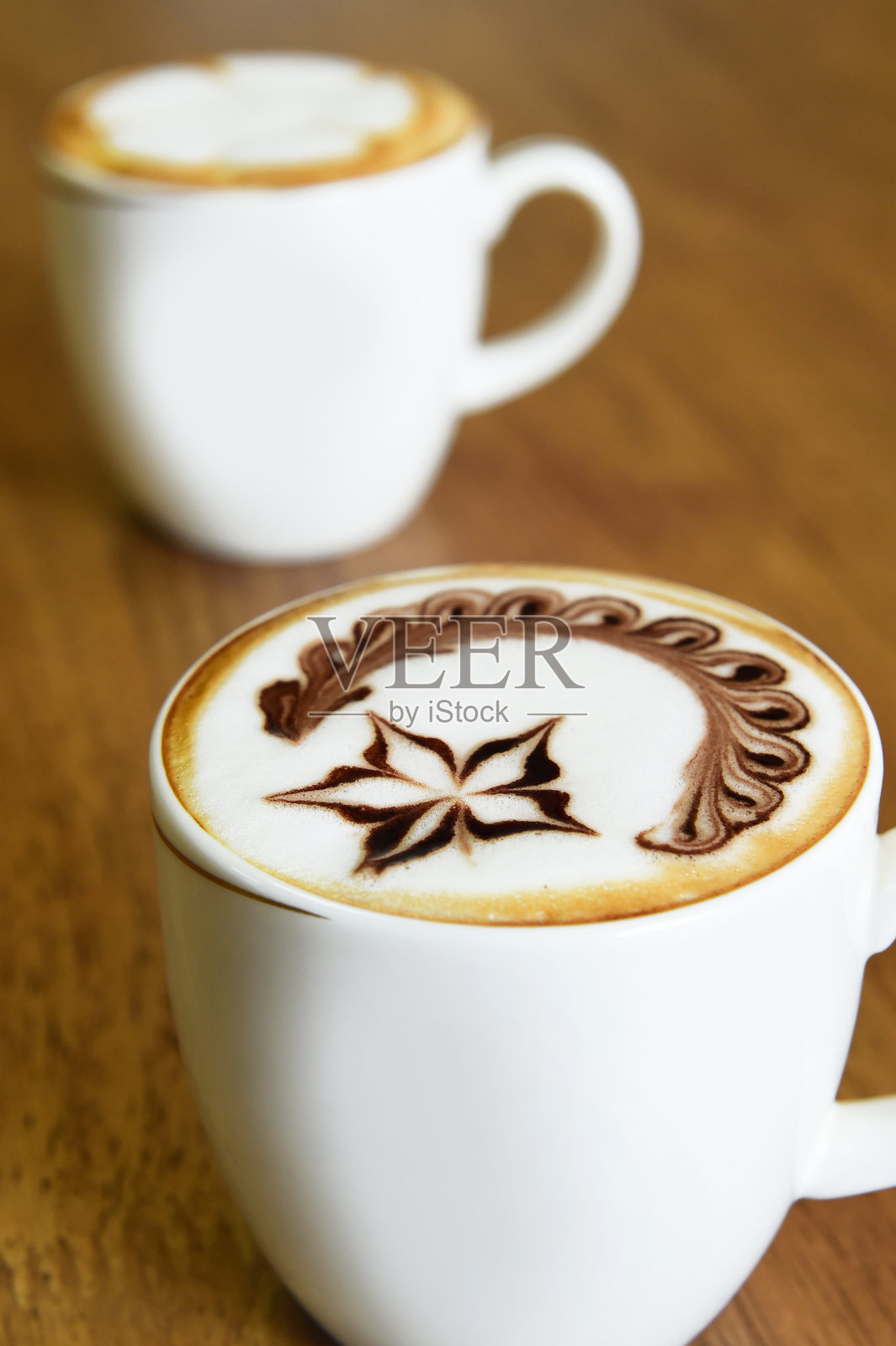 一杯拉花咖啡照片摄影图片