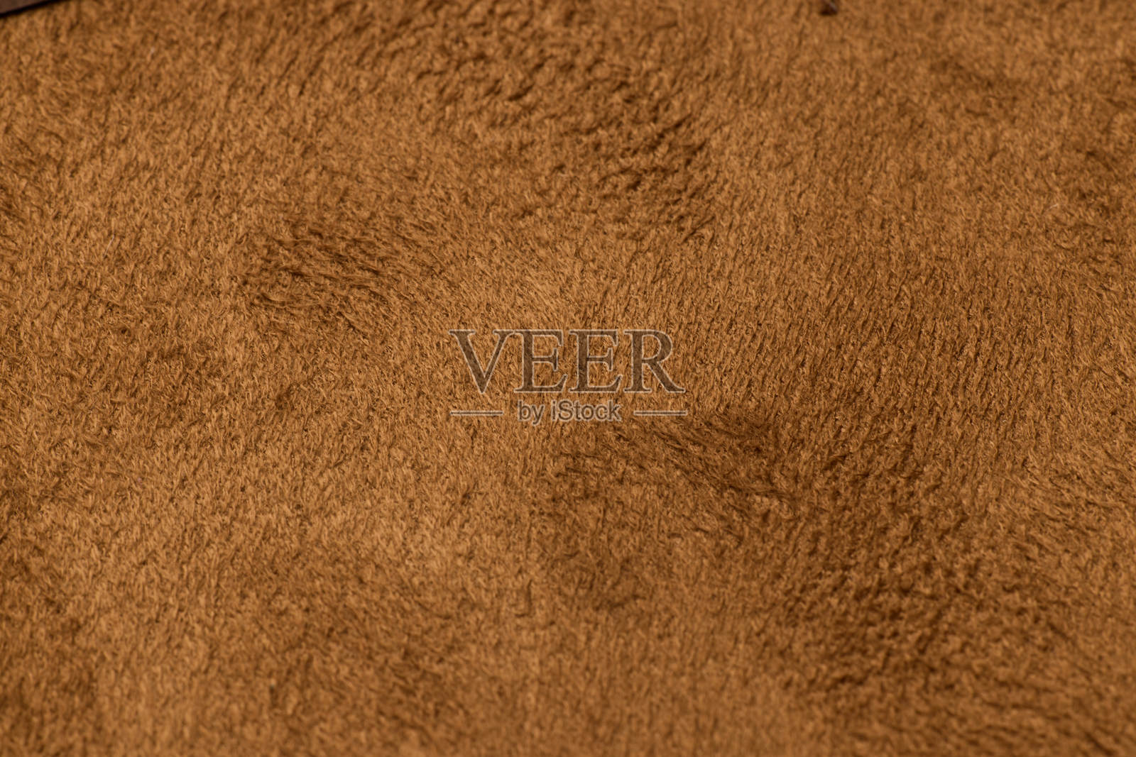 这种奢华的绒面织物呈现出丰富的温暖棕色,适合多种用途。照片摄影图片