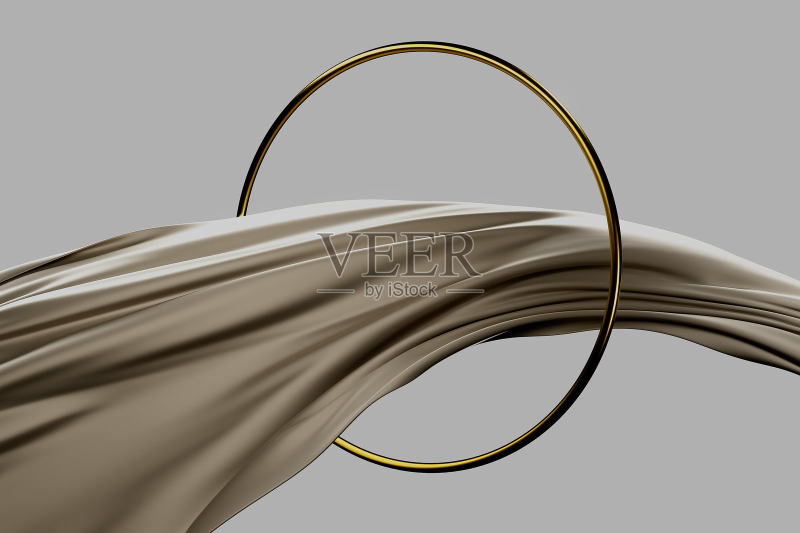 在一块布料上画了一个金色的圆圈照片摄影图片