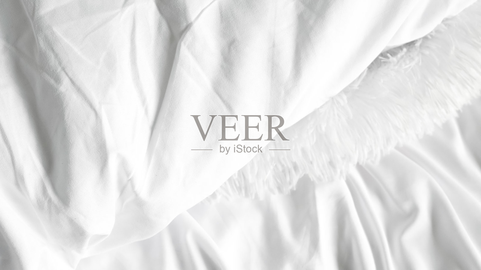 光滑的白色丝绸床单,柔软奢华的面料,优雅的毯子背景照片摄影图片