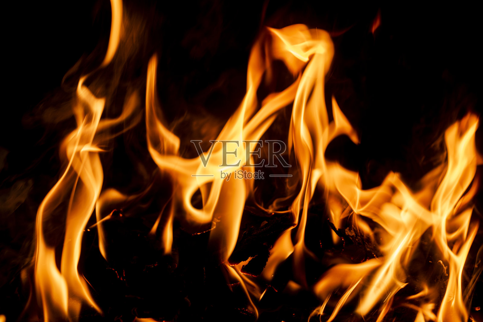 火焰背景。火焰。篝火纹理。燃烧的篝火。火焰壁纸。带有空白空间的篝火背景。火焰纹理背景。照片摄影图片