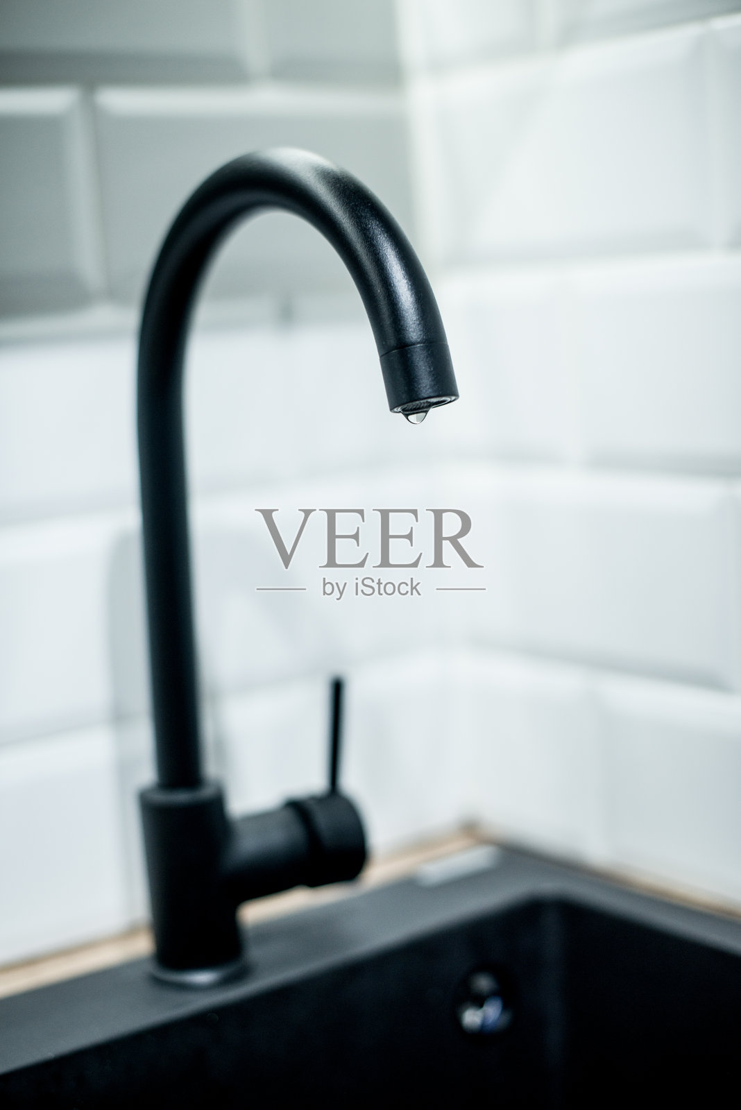 黑色水龙头照片摄影图片