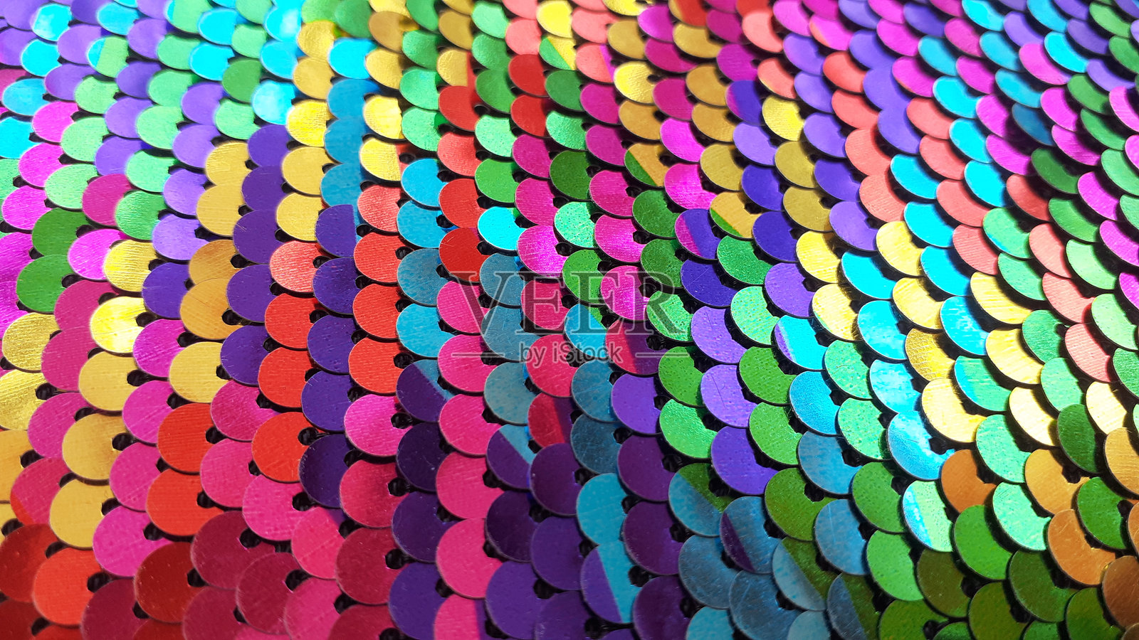 彩虹色鳞片图案的特写图像照片摄影图片