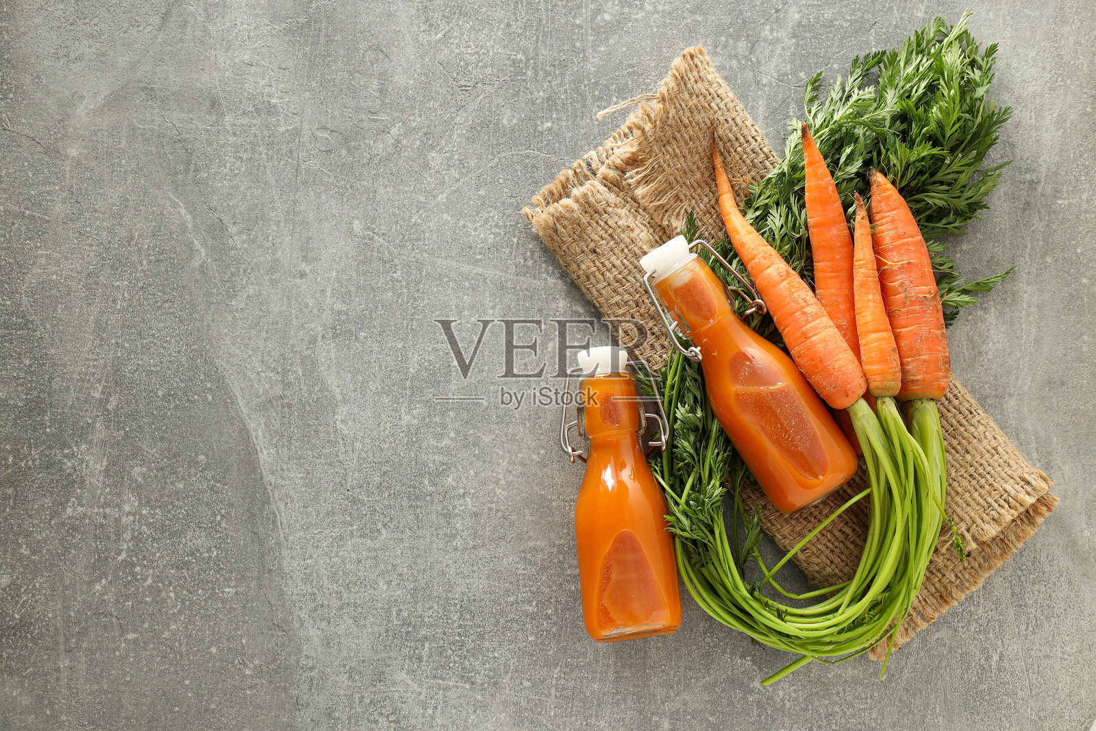 健康营养和饮食的概念与胡萝卜汁照片摄影图片