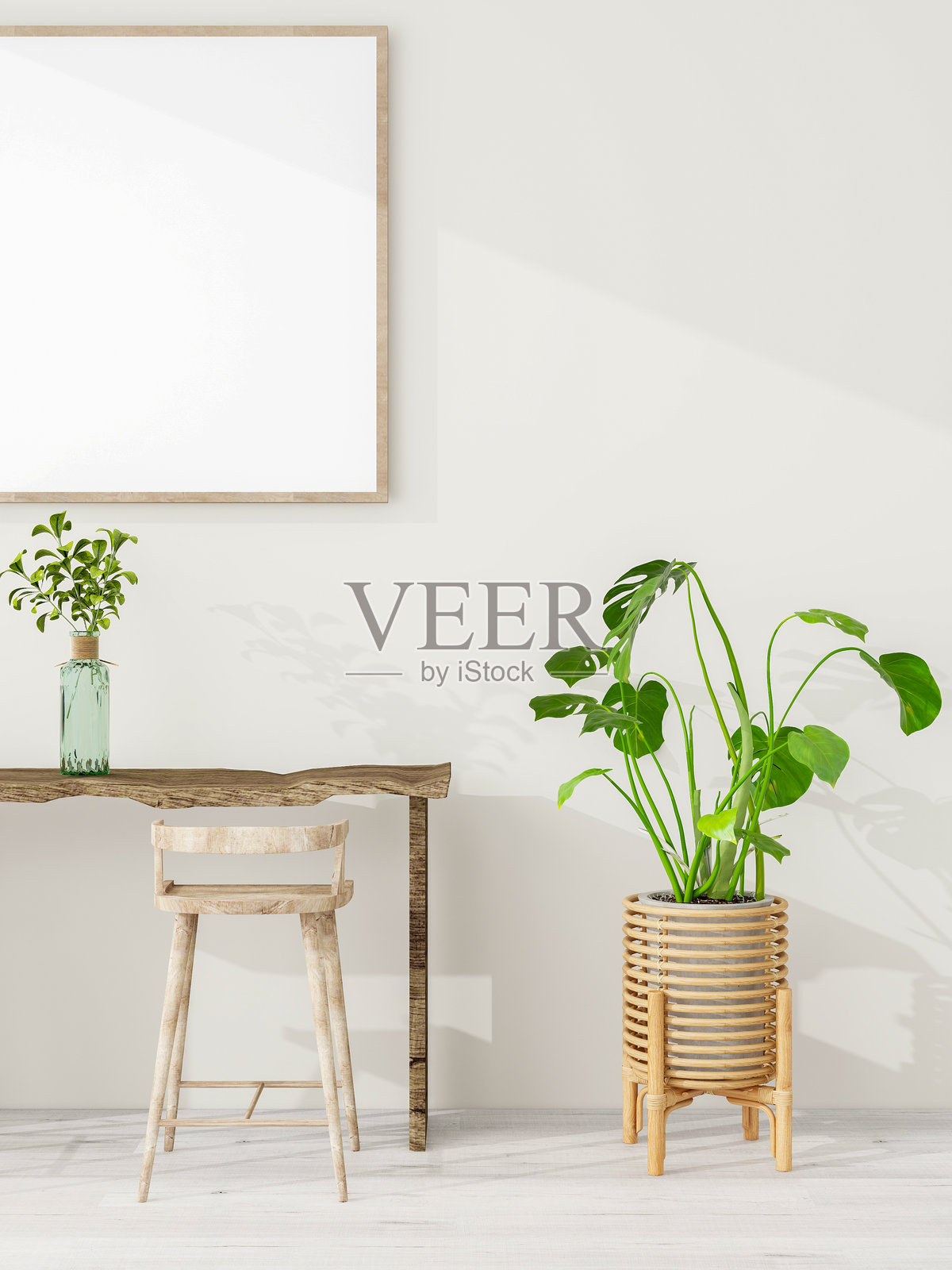 一个极简主义的室内场景,展示了一张乡村风格的木桌,配有两个凳子,一个盆栽植物,以及一幅空白的画框,背景是浅色墙壁。垂直视角。照片摄影图片