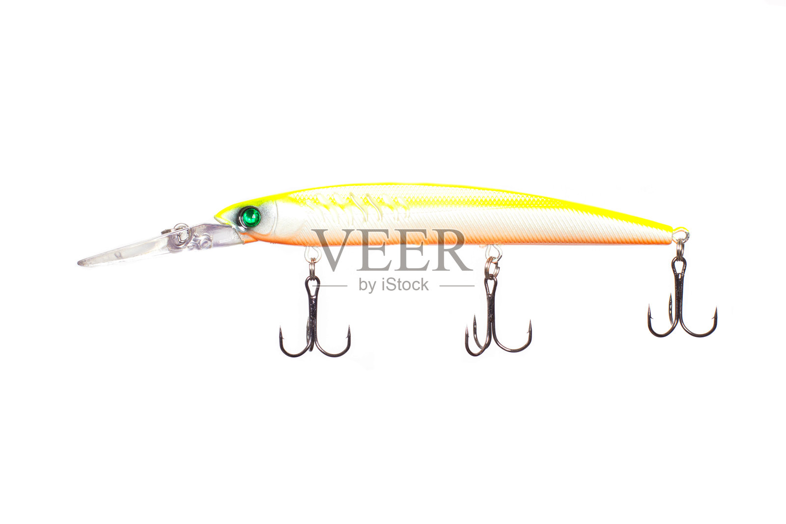 白色背景上的钓鱼勺子,特写镜头带钩子照片摄影图片