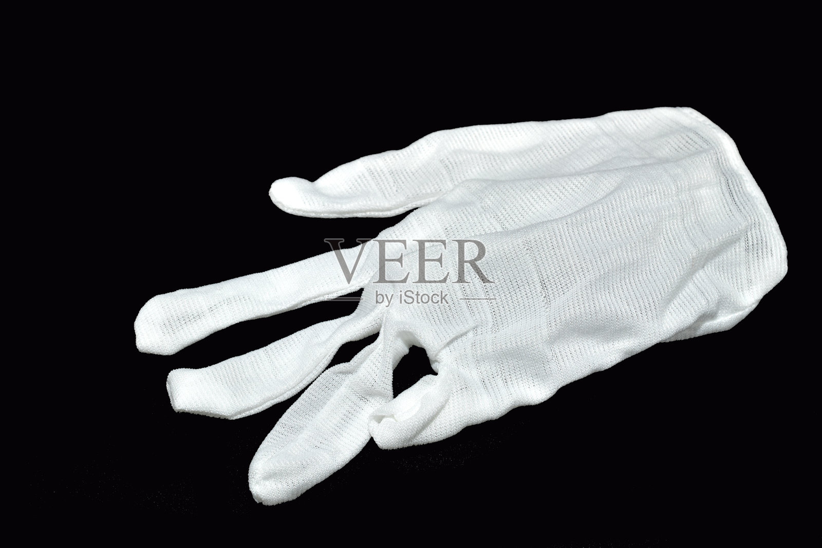 薄白色工作手套。照片摄影图片