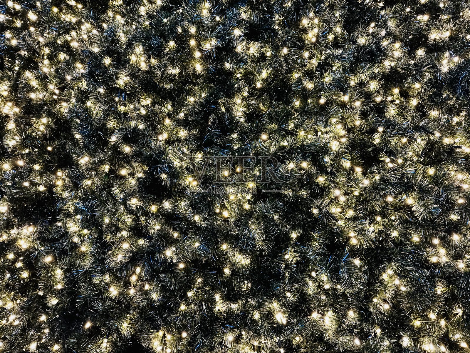 圣诞树上的灯光特写照片摄影图片