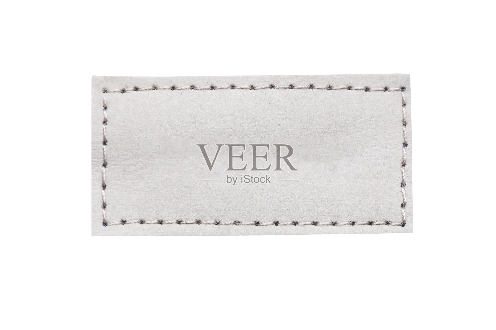 灰色皮革腰带带子特写,孤立在白色背景上。灰色缝合皮革接缝框标签孤立在白色背景上。照片摄影图片