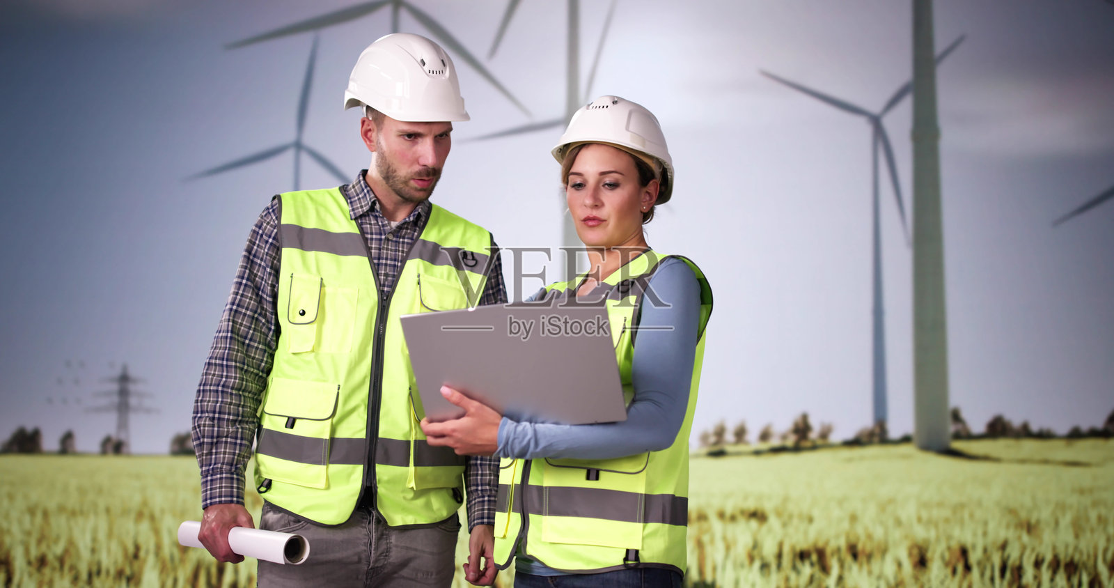 风能工程师与笔记本电脑照片摄影图片