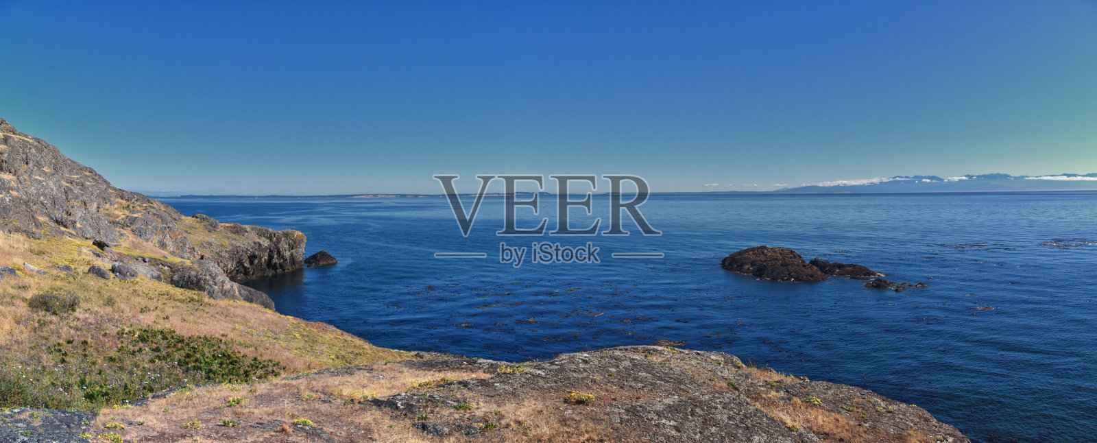 华盛顿州洛佩兹岛西南端冰山点的圣胡安群岛海岸景观。照片摄影图片