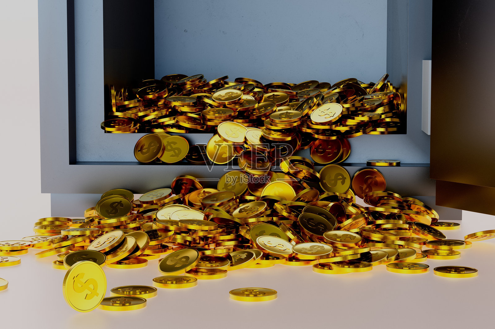 一堆金币从保险箱里掉出来照片摄影图片