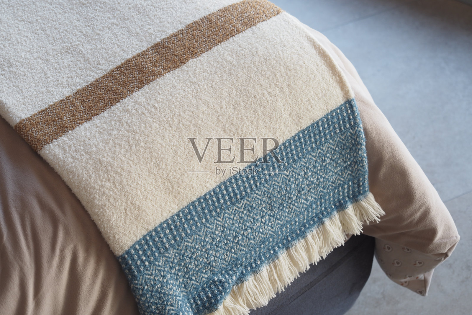 享受一条舒适且有质感的毛毯,完美提升您的家居装饰和风格照片摄影图片