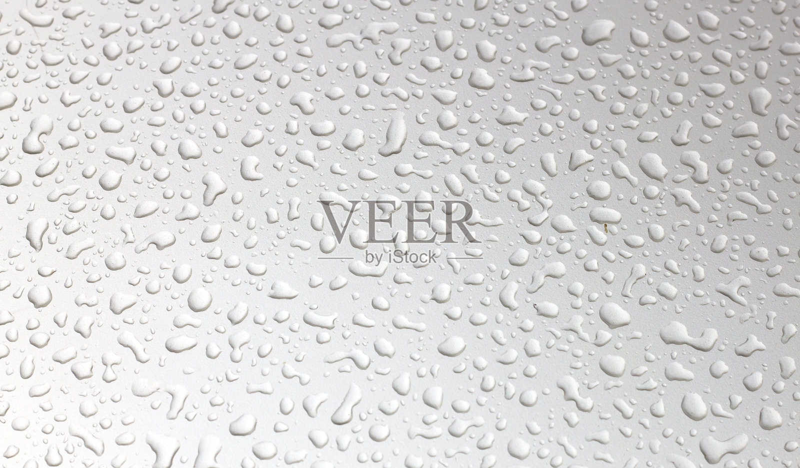 白色青铜墙上的水滴照片摄影图片