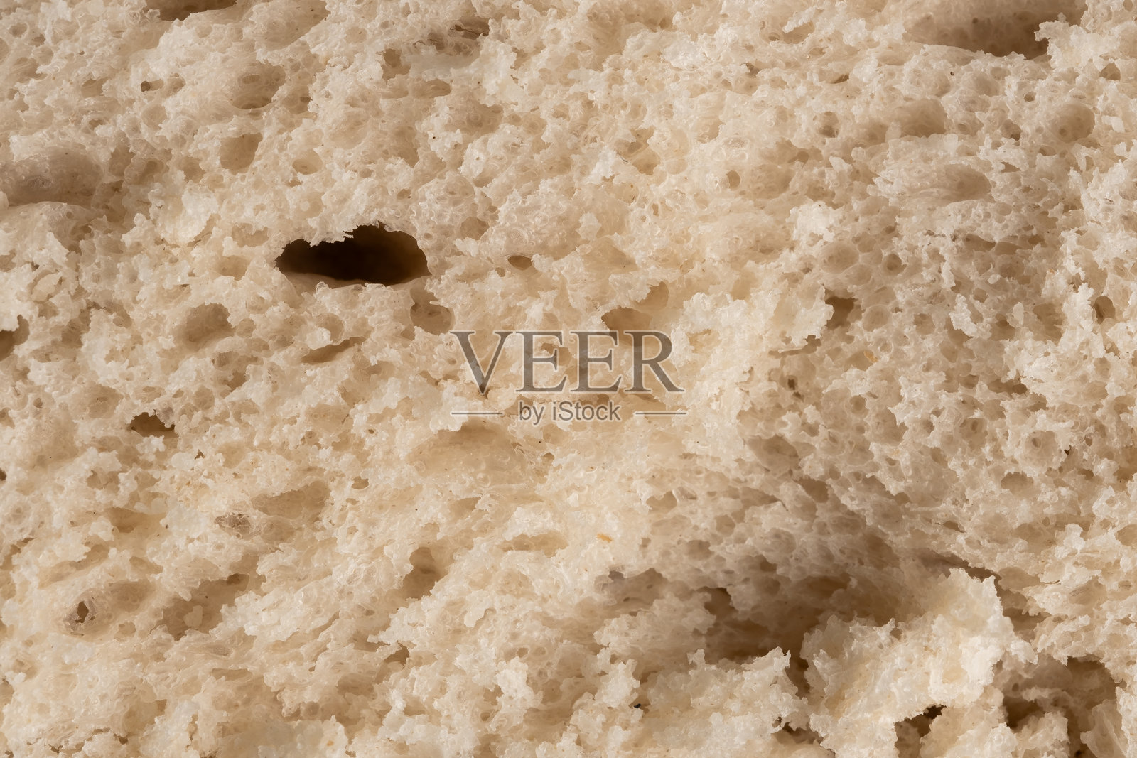 面包纹理特写。全谷物面包背景。微距。照片摄影图片