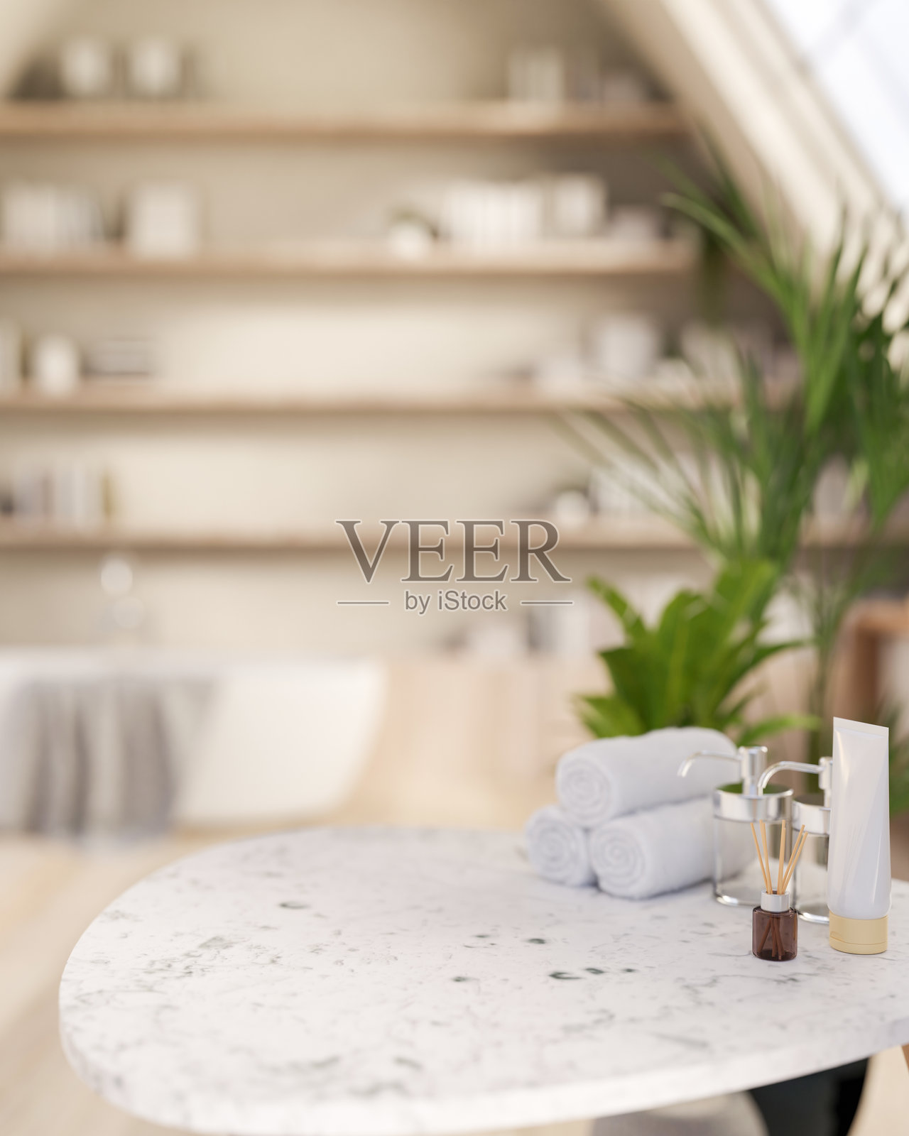 一个圆形白色大理石桌子,上面摆放着浴室配件,位于一个美丽的斯堪的纳维亚风格浴室中。照片摄影图片