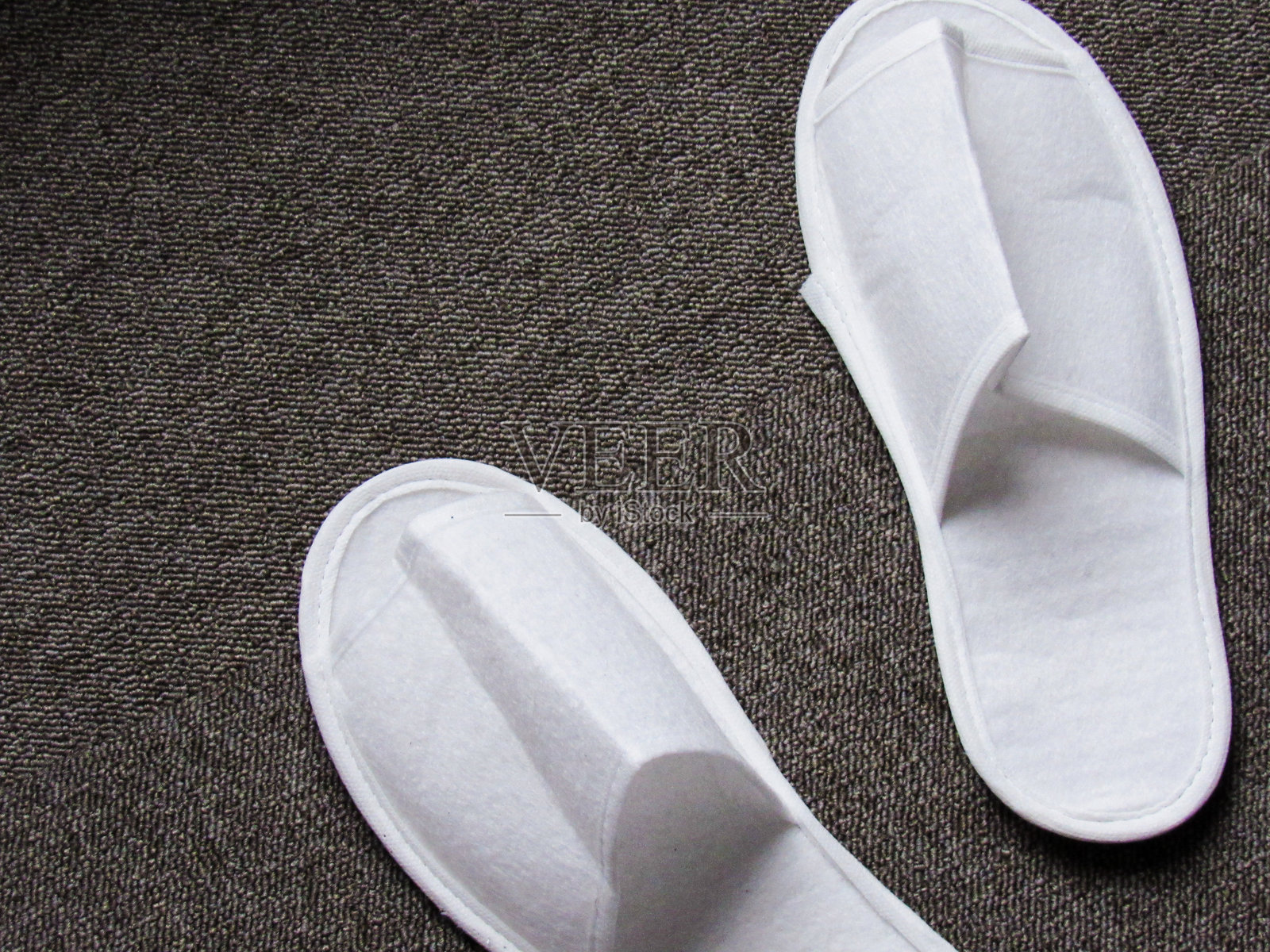 白色一次性酒店拖鞋照片摄影图片