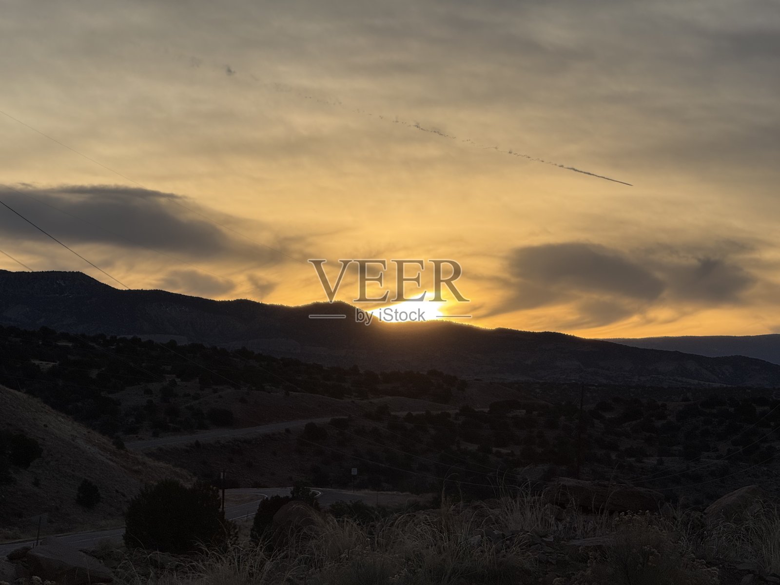 阿比基乌山丘上的日落照片摄影图片