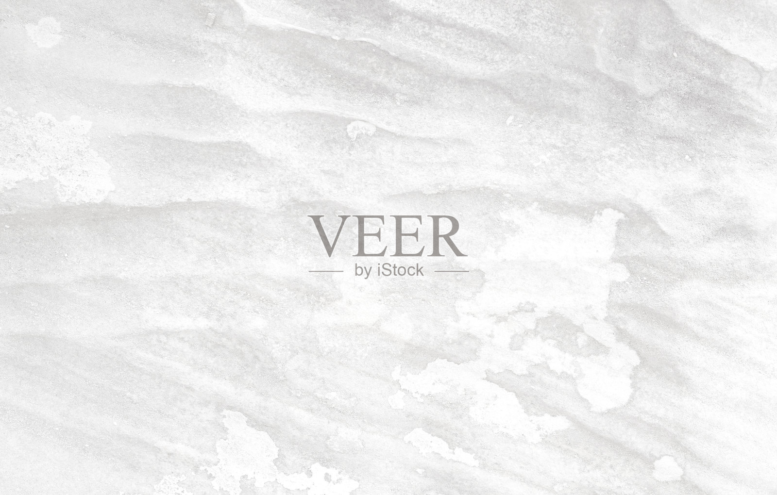 浅灰色石墙背景。黑白色带有沟槽表面的岩石。单色抽象图案。自然背景。天然岩石纹理。元素,材料设计。照片摄影图片