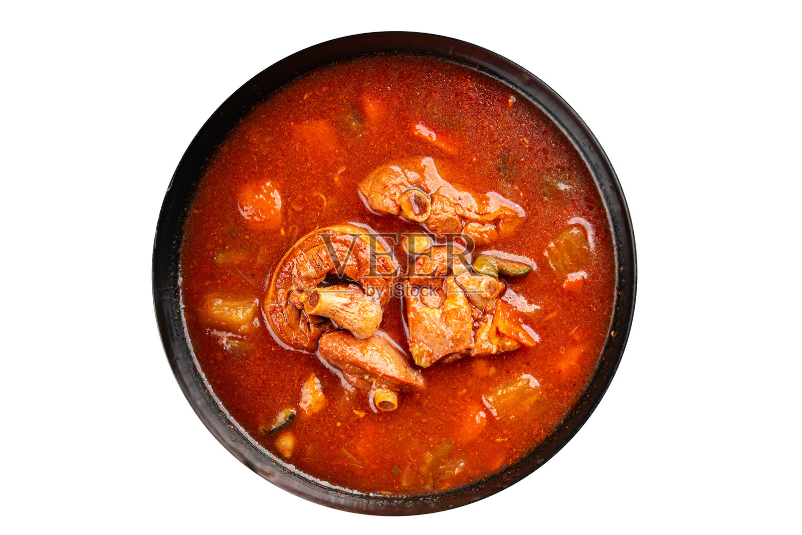 番茄肉汤蔬菜炖菜,新鲜美味的菜肴,令人垂涎的美食背景,桌面上的乡村风格美食俯视图,留白,适合生酮和古饮食。照片摄影图片