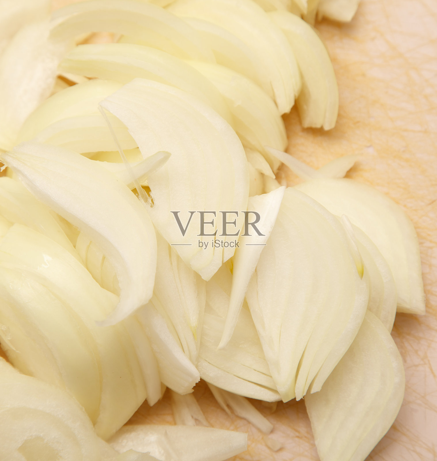 切菜板上切碎的洋葱特写照片摄影图片