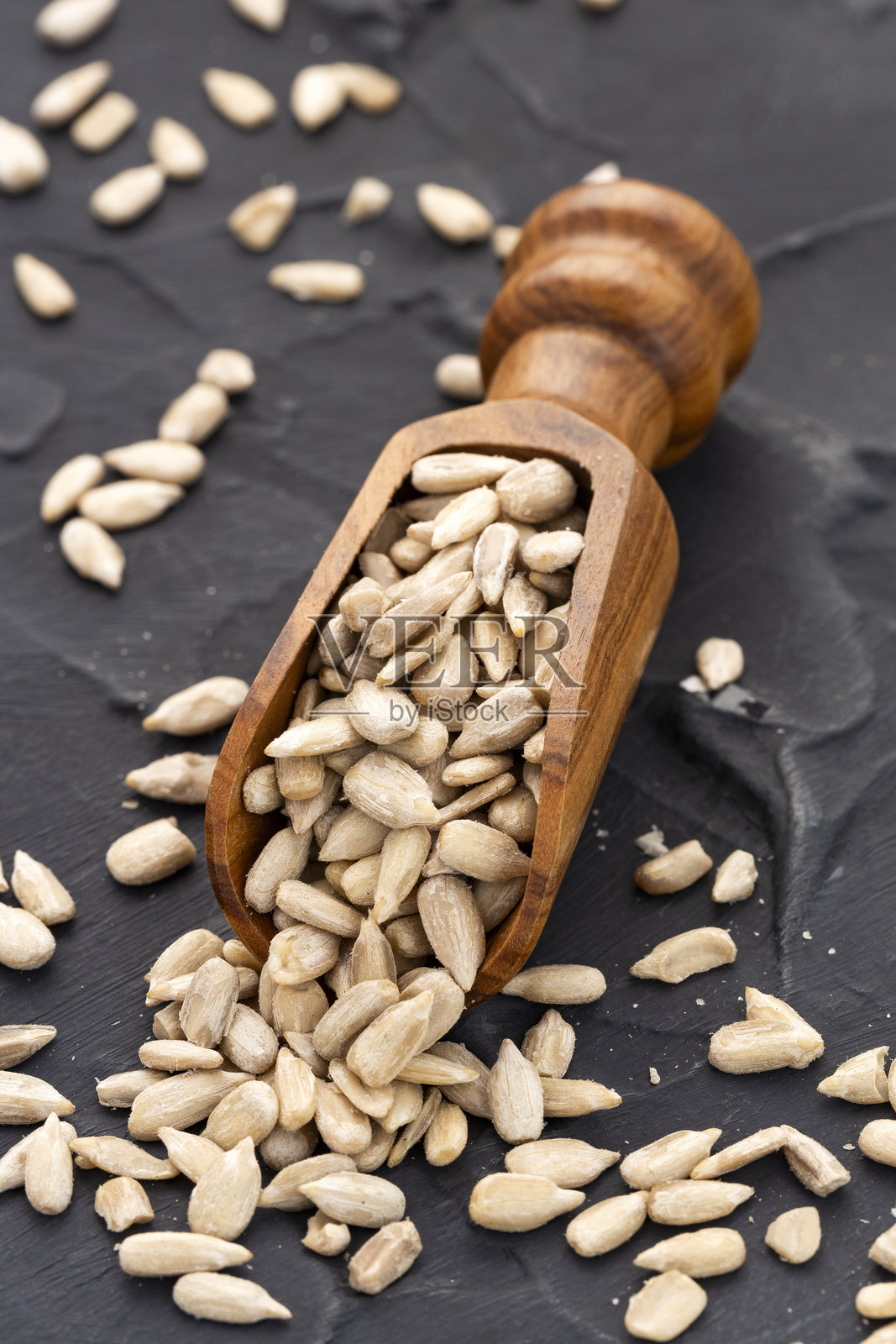 向日葵 - 有机去壳葵花籽。照片摄影图片