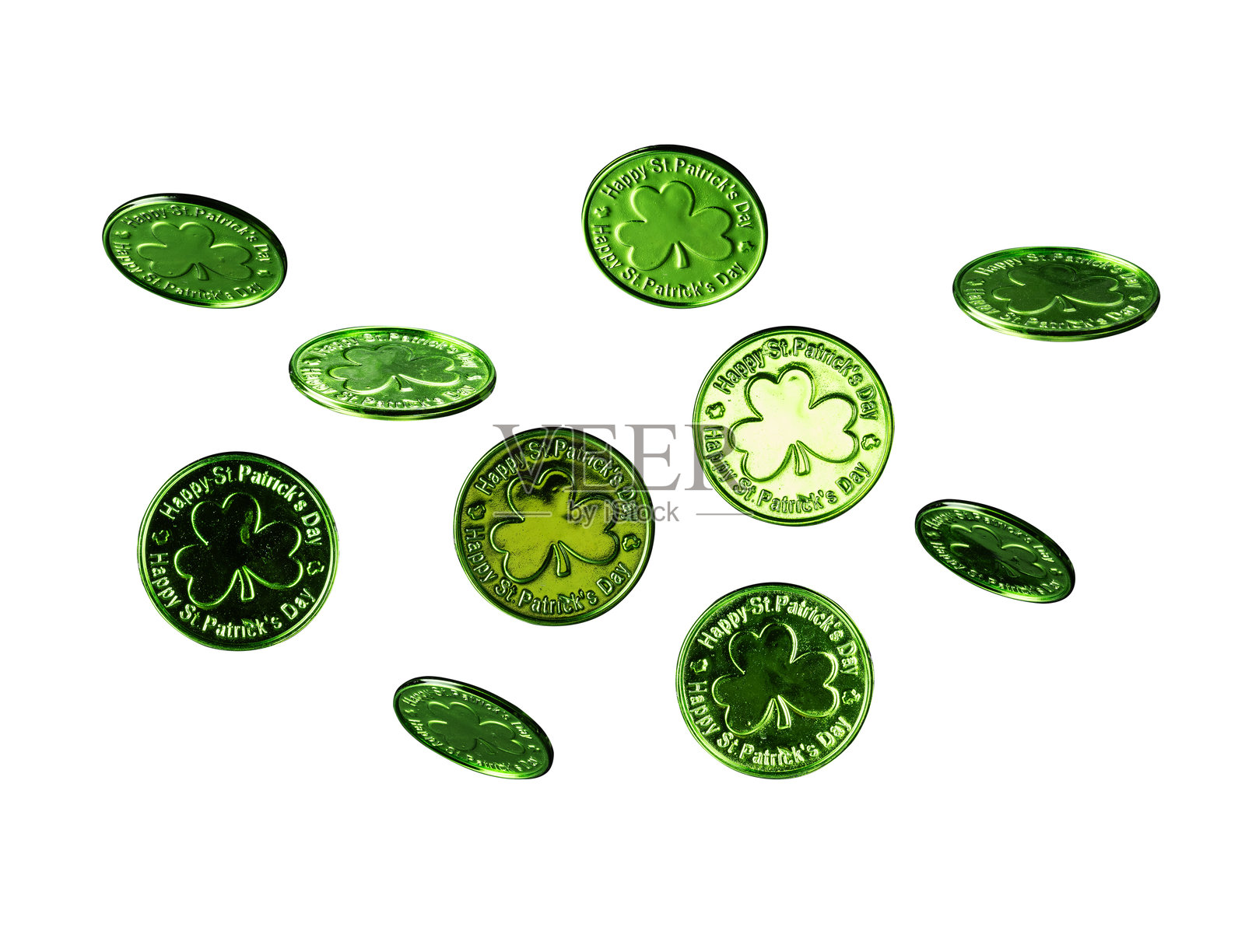 一组圣帕特里克节的闪亮绿色硬币,孤立在白色背景上,供设计使用。照片摄影图片