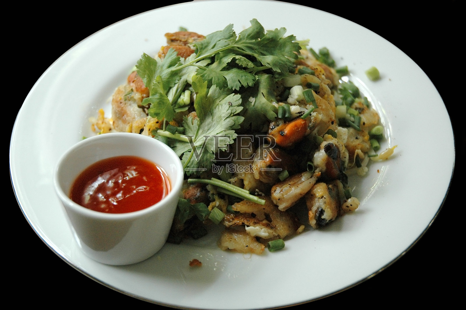 炸贻贝煎蛋卷照片摄影图片