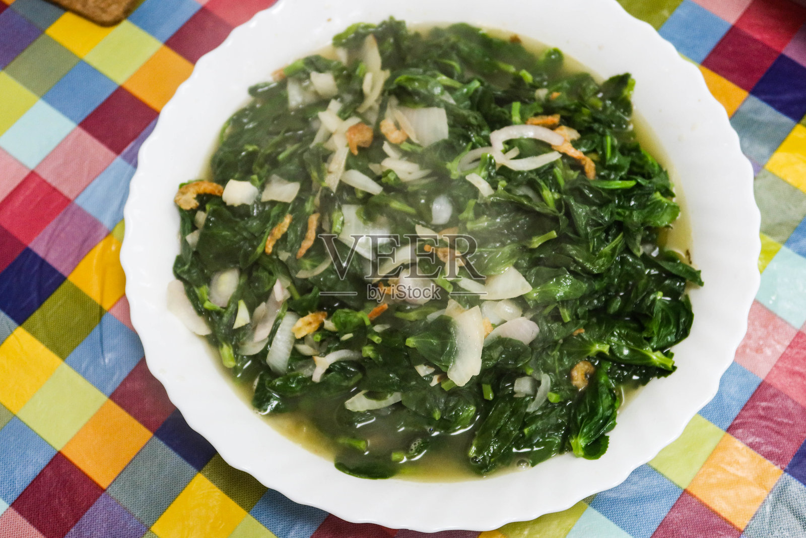 自制香港风味炒汤雪豆苗和大蒜照片摄影图片