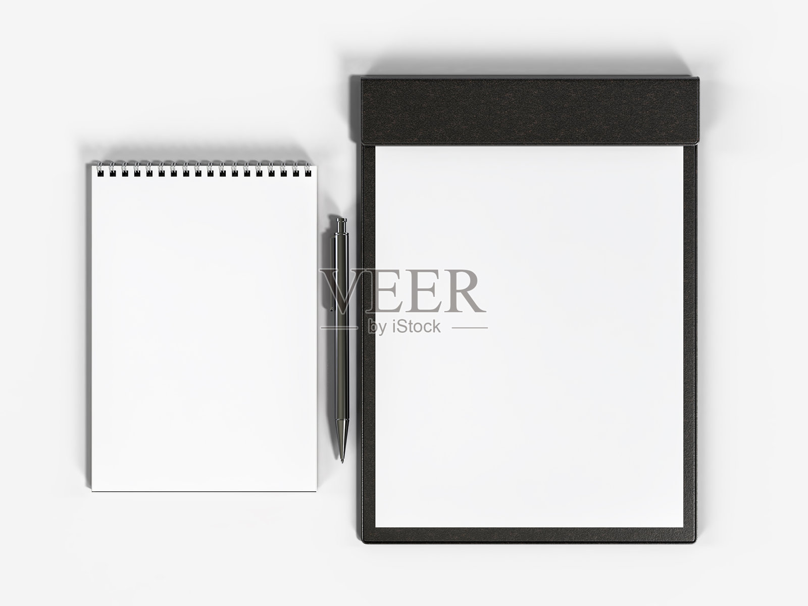空白企业品牌文具模型,包括办公纸张、手册、文件夹、笔记本和钢笔。企业形象文具模型,独立于白色背景,用于品牌识别。照片摄影图片