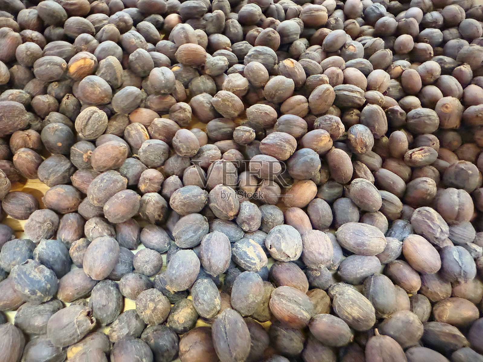 印度市场上的可可豆特写。照片摄影图片