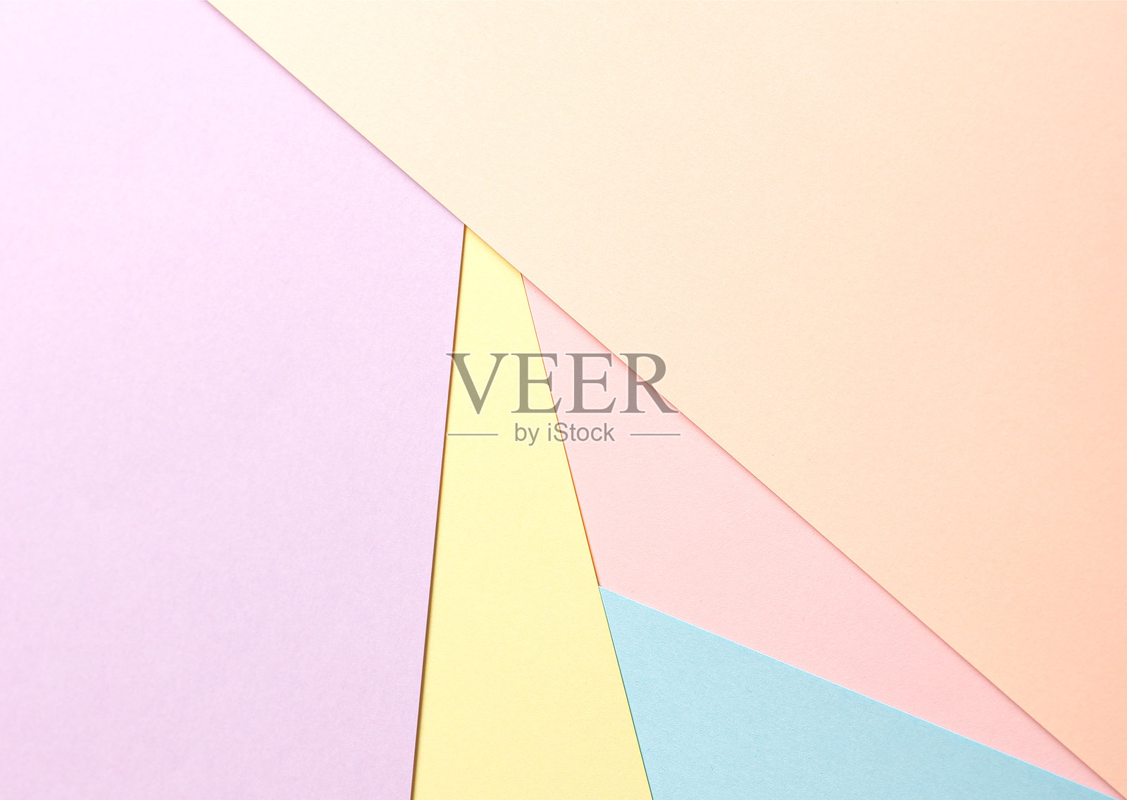 粉彩抽象几何纸背景,包含桃色、薰衣草色、黄色、粉色和蓝色。照片摄影图片