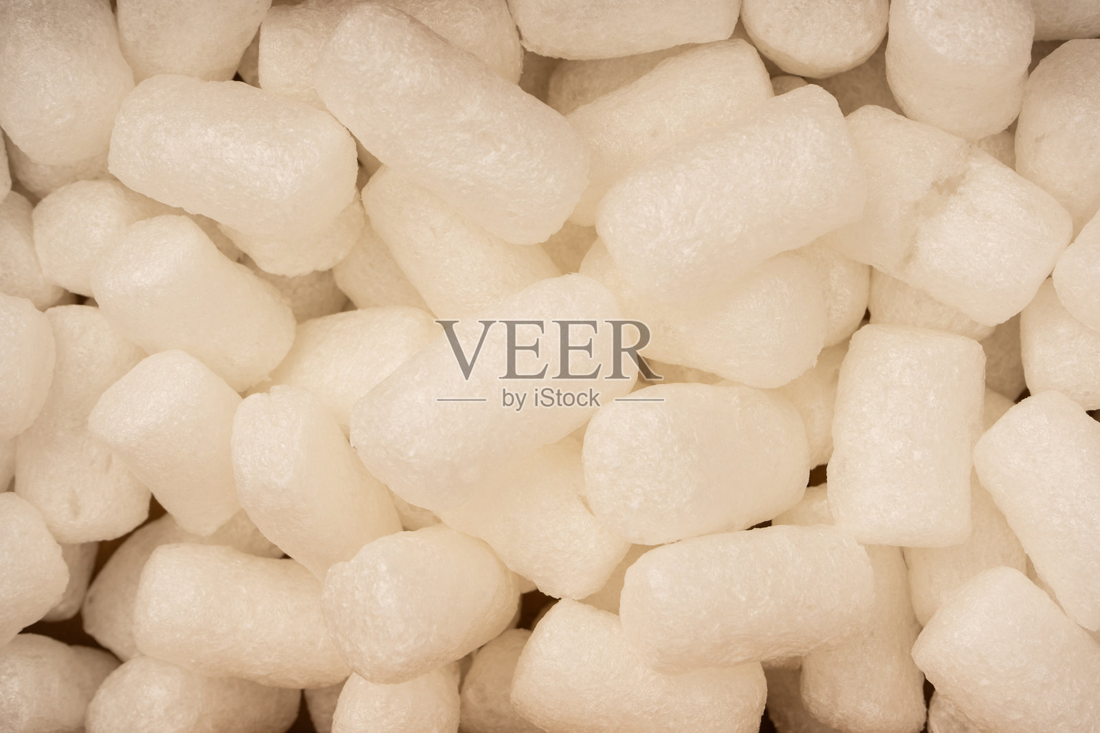 粉色和白色的盒子填充物作为背景。俯视图。照片摄影图片