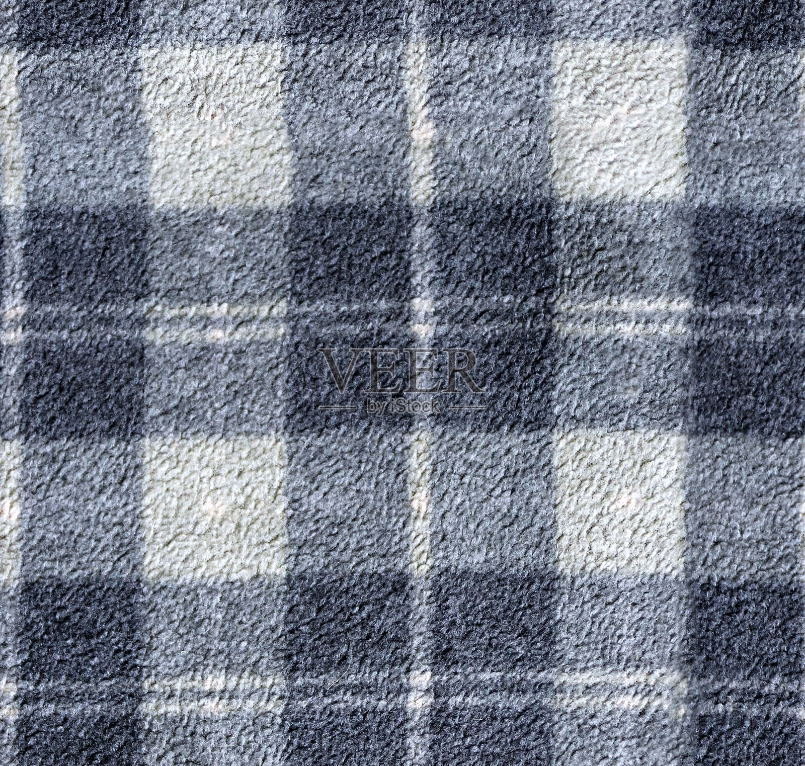 无缝的灰色格子图案绒面背景。可重复的绒面织物纹理,带有方格图案。无尽的纹理可用于平铺图案填充、网页背景。照片摄影图片