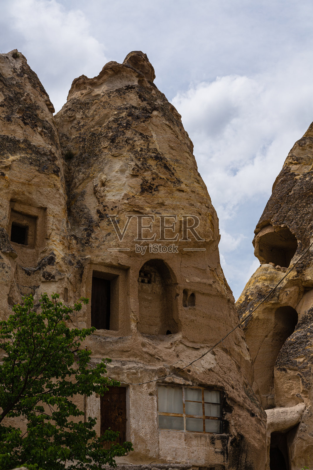 土耳其卡帕多奇亚的乌尔居普洞穴住宅,旅游基地照片摄影图片