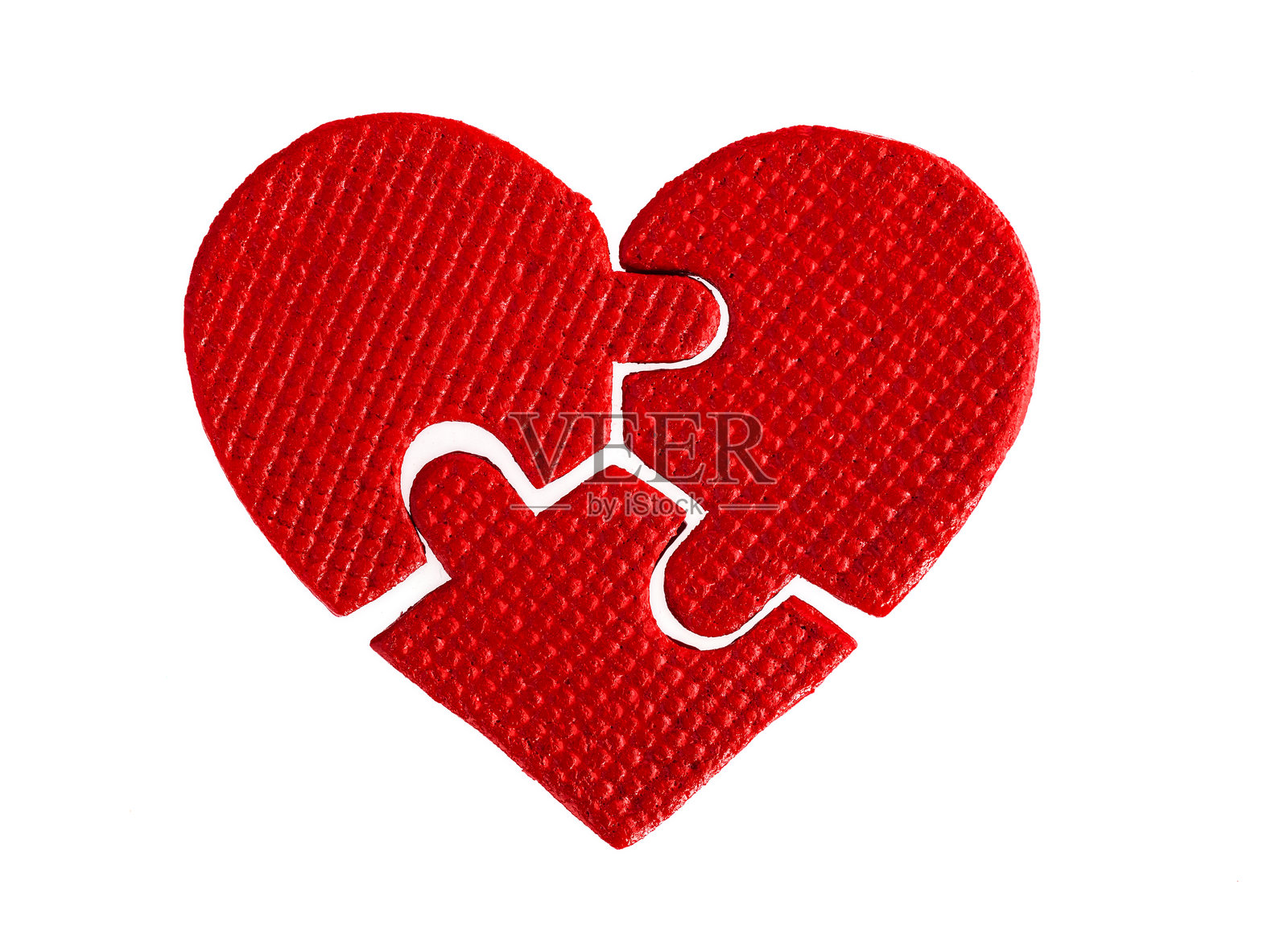 白色背景上的红色心形拼图块照片摄影图片