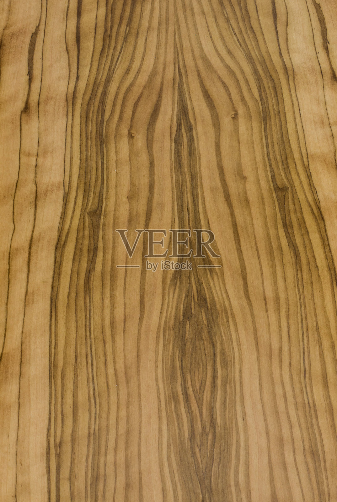 木材纹理。木板。珍贵的原材料,坚固的木材。橄榄树,俯视图。垂直纹理。特写。照片摄影图片