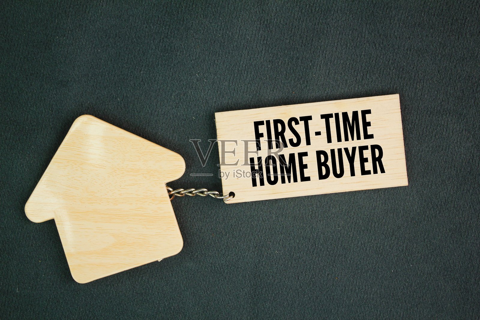 房屋形状与“首次购房者”字样。购房概念照片摄影图片