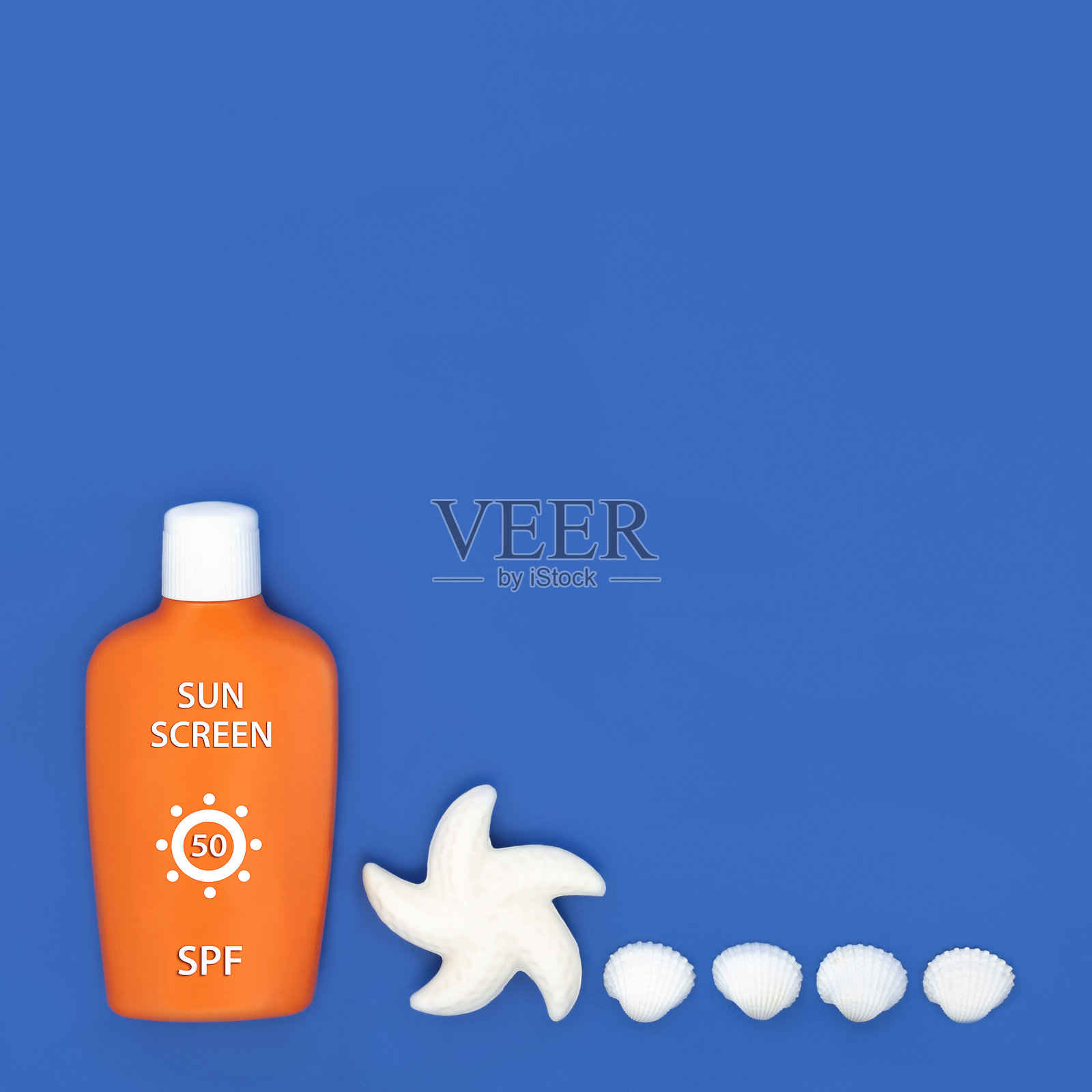 防晒乳液瓶 夏季假期必备的肌肤保护照片摄影图片