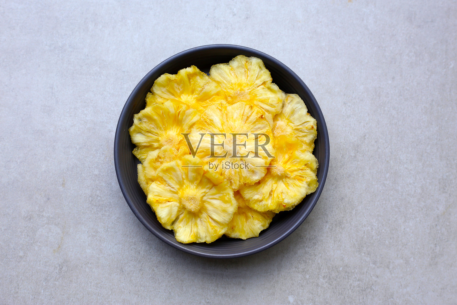 甜美的菠萝小吃,干菠萝片照片摄影图片