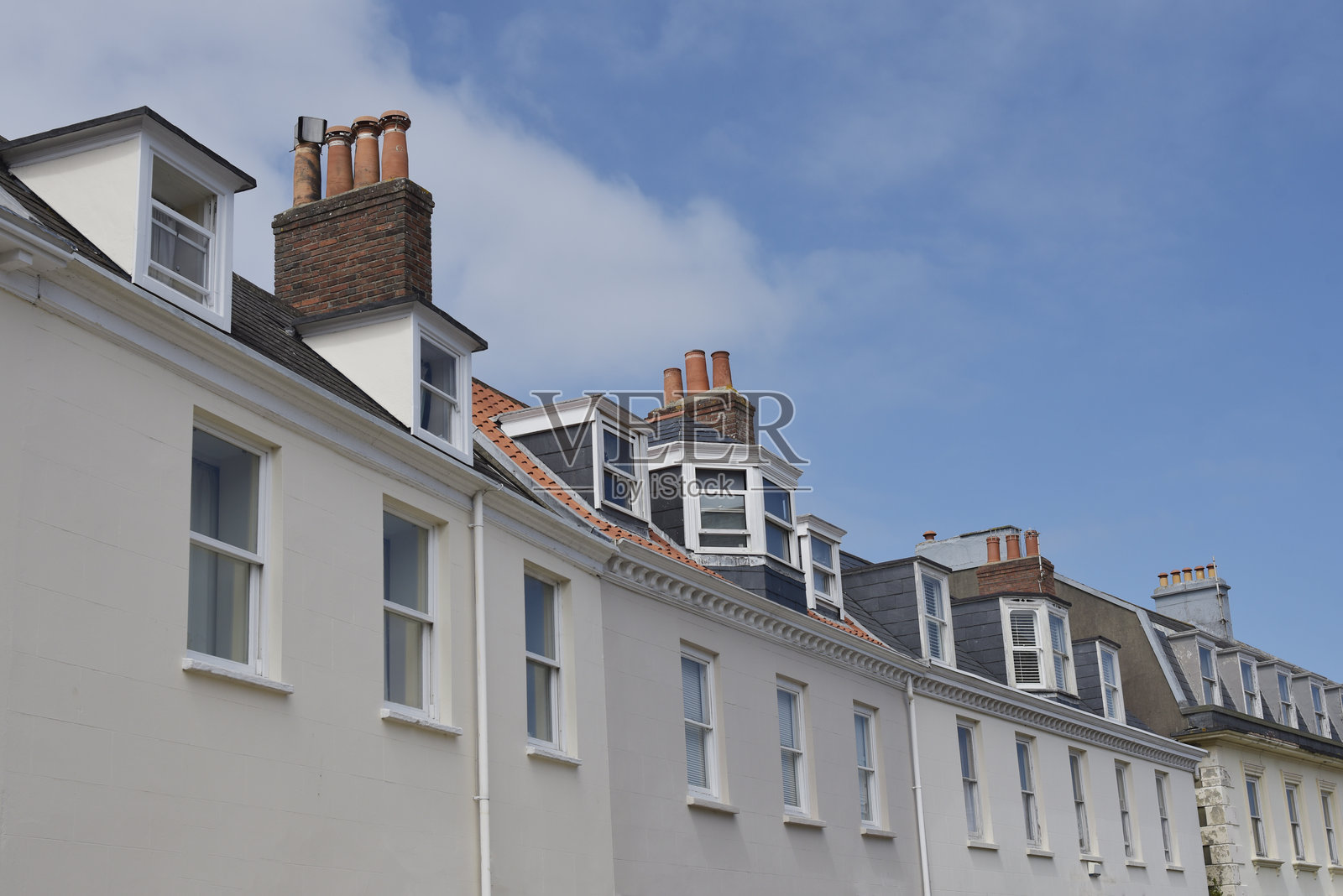 根西岛的两层房屋照片摄影图片