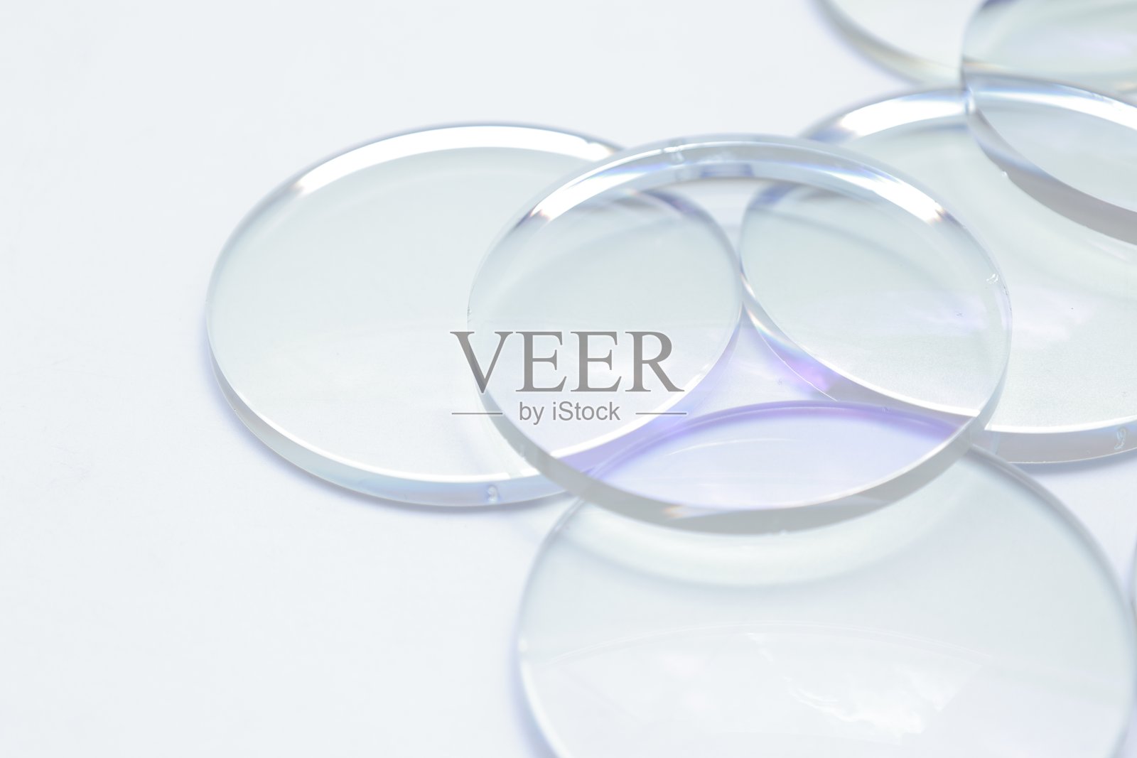 眼镜镜片生产行业,特写眼镜镜片,眼镜镜头,眼镜镜片,眼镜店商业概念照片摄影图片