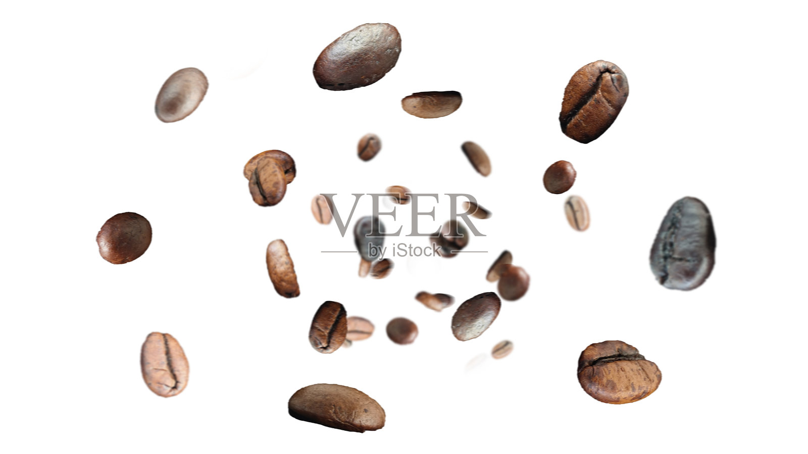 运动模糊的咖啡豆在空中飞溅。照片摄影图片